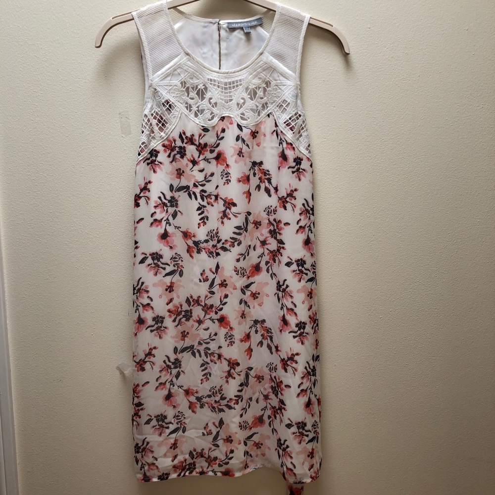 Off-white sleeveless dress with floral prints